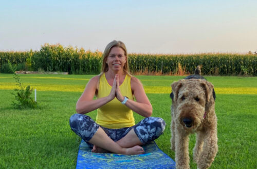 women doing yoga with a dog